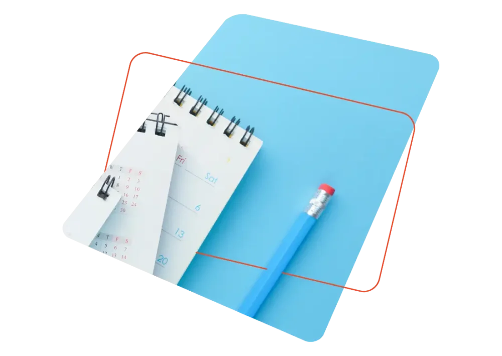Carnet de calendrier et crayon symbolisant la planification des rendez-vous médicaux en entreprise