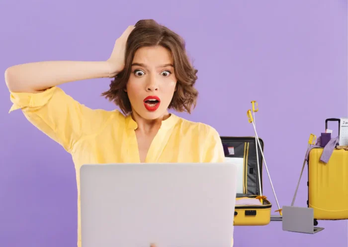 Gestion des absences en entreprise : une employée stressée devant son ordinateur avec des